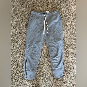 grey with zippers on bottoms joggers